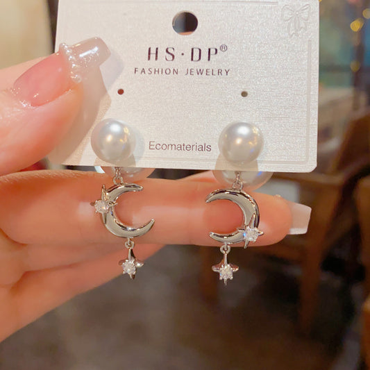 European and American cross-border personalized fashion pearls wear star and moon fringed earrings before and after temperament light luxury gentle versatile earrings women