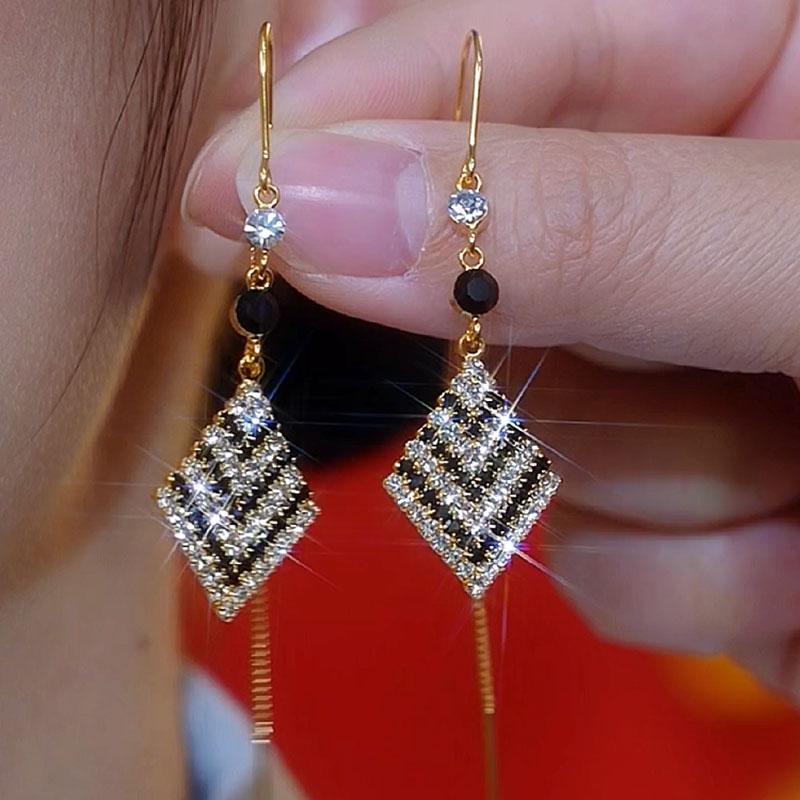Unique design high-end thousand bird grid rhombus earrings, black and white zircon super flash long tassel earrings show face and thin woman