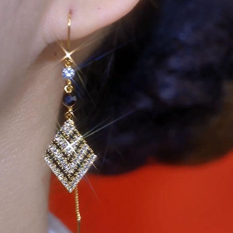 Unique design high-end thousand bird grid rhombus earrings, black and white zircon super flash long tassel earrings show face and thin woman