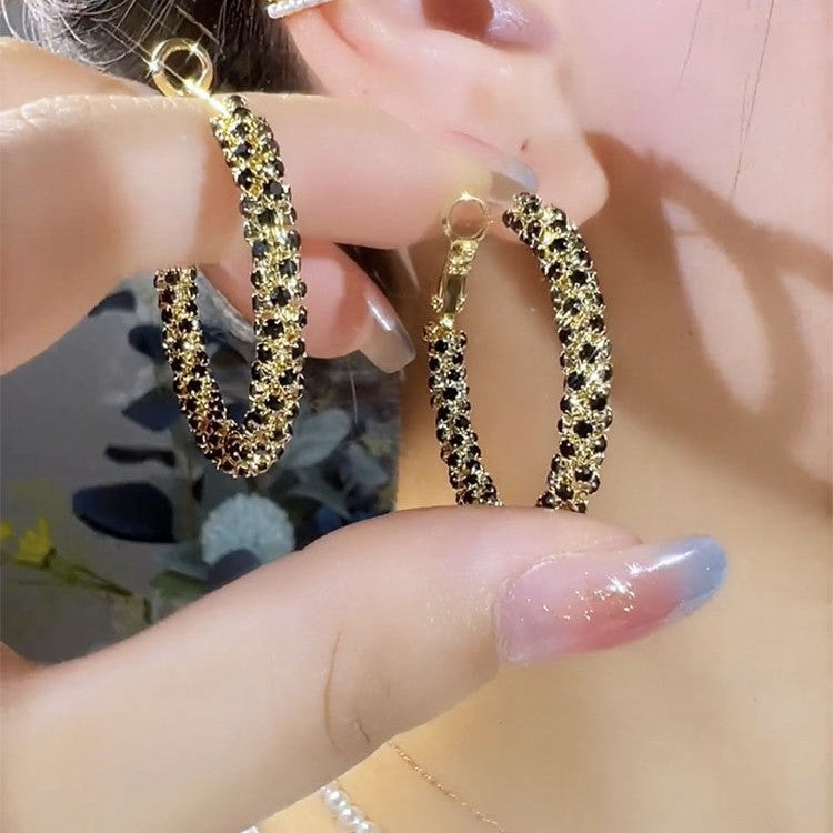 High-end circle black red full diamond gold circle earrings women's retro fashion spiral light luxury atmospheric ear jewelry