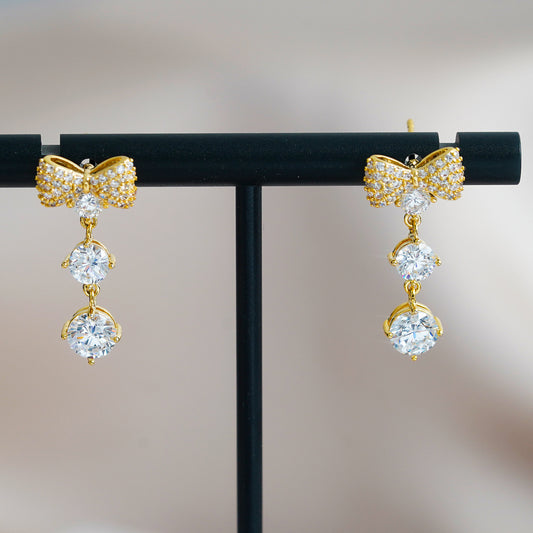 Internet celebrities with the same bow zircon stud earrings women's niche earrings temperament versatile holiday gift butterfly tassel earrings