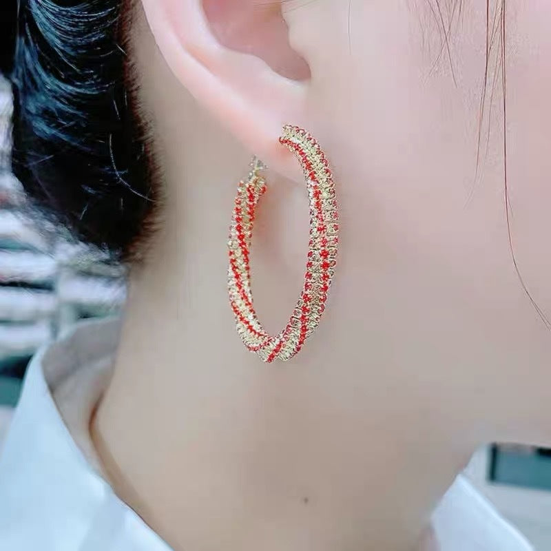 High-end circle black red full diamond gold circle earrings women's retro fashion spiral light luxury atmospheric ear jewelry
