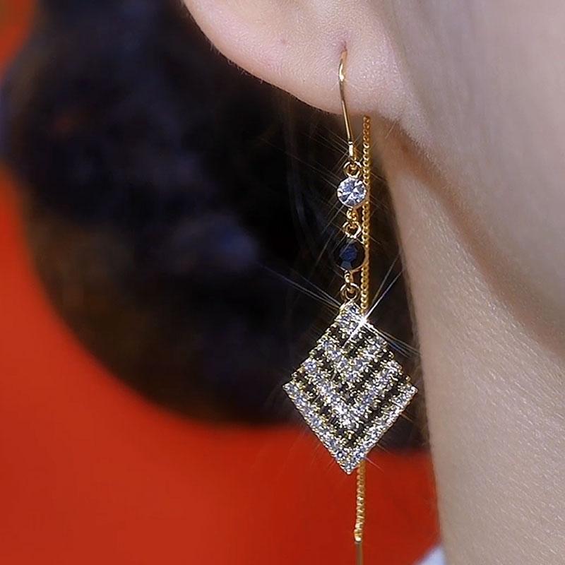 Unique design high-end thousand bird grid rhombus earrings, black and white zircon super flash long tassel earrings show face and thin woman